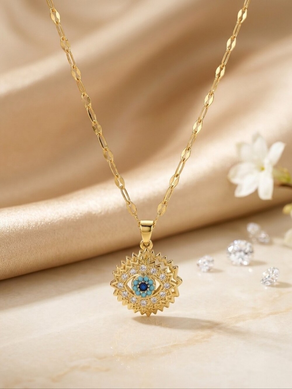 Gold Spinning Evil Eye Pendant Necklace with Blue Cubic Zirconia